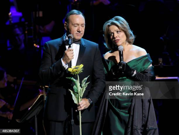 Kevin Spacey and Renee Fleming perform onstage at The 2014 Revlon Concert For The Rainforest Fund at Carnegie Hall on April 17, 2014 in New York City.