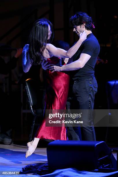 Alessandra Ferri and Herman Cornejo perform onstage at The 2014 Revlon Concert For The Rainforest Fund at Carnegie Hall on April 17, 2014 in New York...