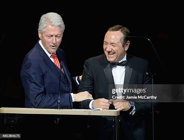 President Bill Clinton and Kevin Spacey speak during the 25th Anniversary Rainforest Fund Benefit Concert at Carnegie Hall on April 17, 2014 in New...