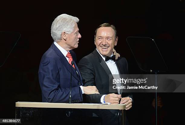 President Bill Clinton and Kevin Spacey speak during the 25th Anniversary Rainforest Fund Benefit Concert at Carnegie Hall on April 17, 2014 in New...