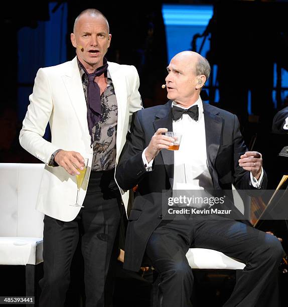 Sting and James Taylor perform onstage during The 2014 Revlon Concert For The Rainforest Fund at Carnegie Hall on April 17, 2014 in New York City.