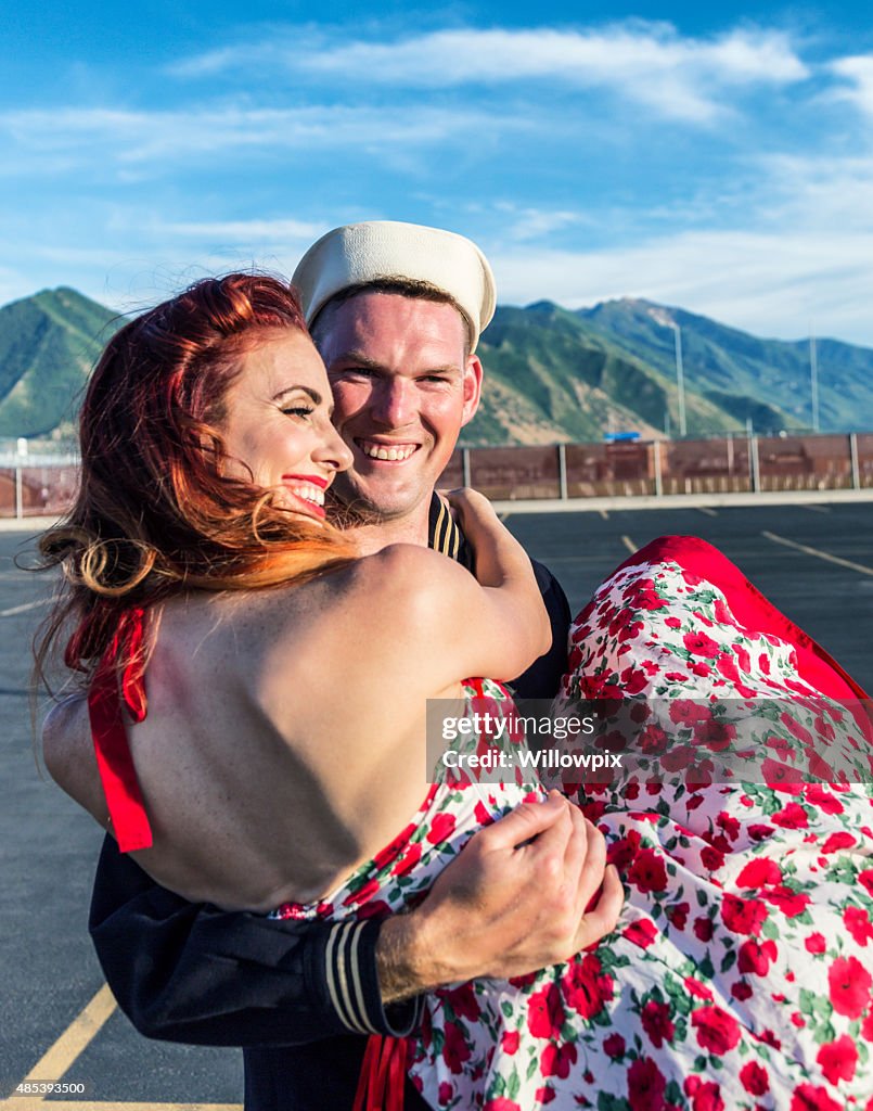 Fifties Pin Up Girl Hugging US Navy Sailor Boyfriend