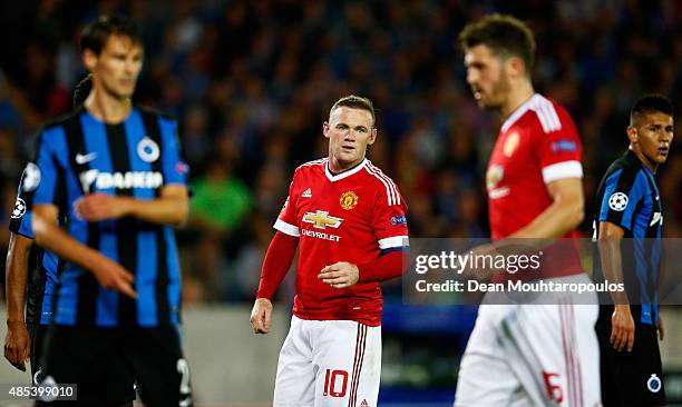 Wayne Rooney of Manchester United looks on during the UEFA Champions League qualifying round play off 2nd leg match between Club Brugge and...