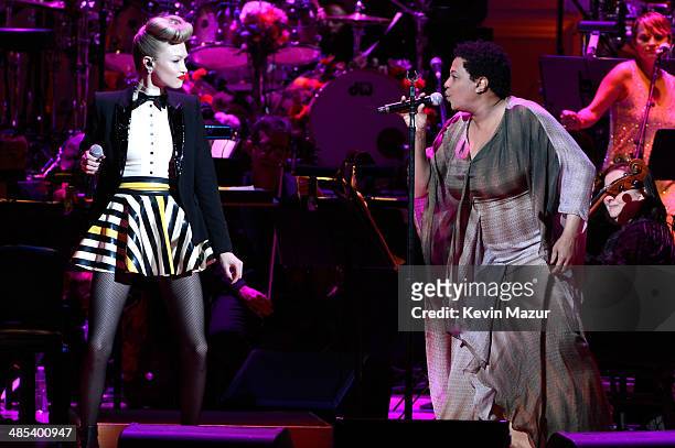 Ivy Levan and Lisa Fischer perform onstage during The 2014 Revlon Concert For The Rainforest Fund at Carnegie Hall on April 17, 2014 in New York City.