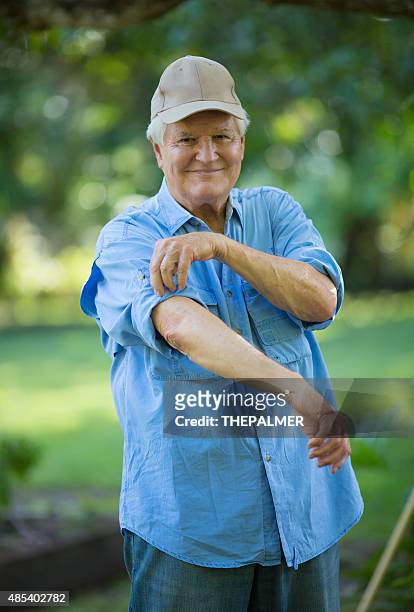 rolling up his sleeves - sleeve roll stock pictures, royalty-free photos & images