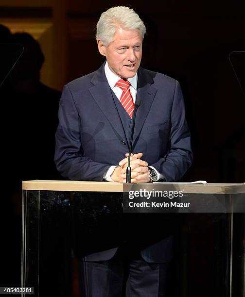 Former United States President Bill Clinton speaks onstage during The 2014 Revlon Concert For The Rainforest Fund at Carnegie Hall on April 17, 2014...