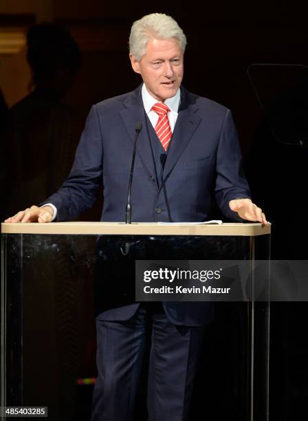 Former United States President Bill Clinton speaks onstage during The 2014 Revlon Concert For The Rainforest Fund at Carnegie Hall on April 17, 2014...