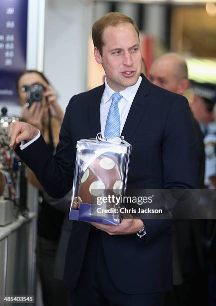 Prince William, Duke of Cambridge is presented with an Easter Egg as he visits the Sydney Royal Easter Show on April 18, 2014 in Sydney, Australia....