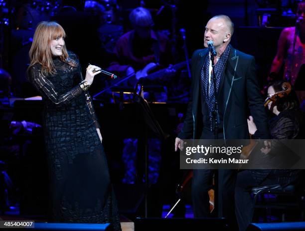 Patti Scialfa and Sting perform onstage during The 2014 Revlon Concert For The Rainforest Fund at Carnegie Hall on April 17, 2014 in New York City.