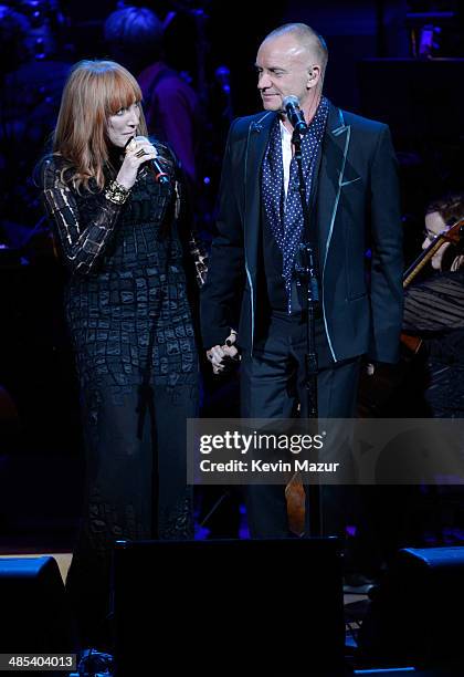 Patti Scialfa and Sting perform onstage during The 2014 Revlon Concert For The Rainforest Fund at Carnegie Hall on April 17, 2014 in New York City.