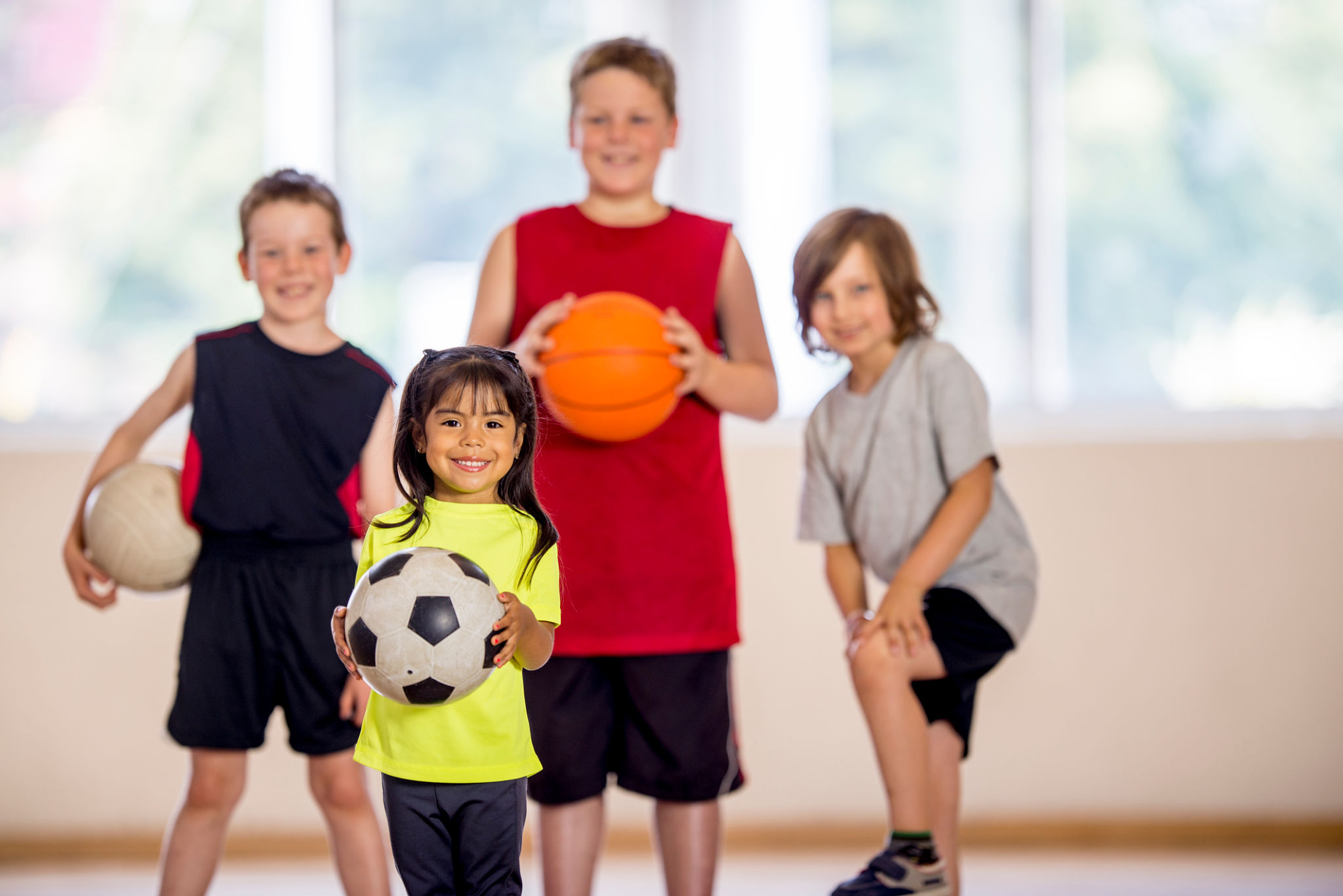children playing different sports