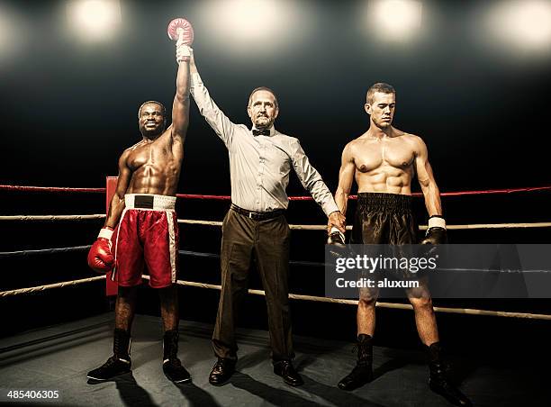 winner of the boxing fight - athlete defeat stock pictures, royalty-free photos & images