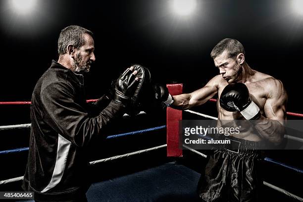 boxing training - boxing coach stock pictures, royalty-free photos & images