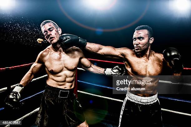 boxing combat - punching stock pictures, royalty-free photos & images