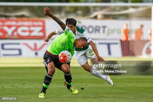 Ruslan Mingazov of FK Jablonec battles for the ball with Tete Kenny of Ajax Amsterdam during the UEFA Europa League Play Off Round 2nd Leg match...