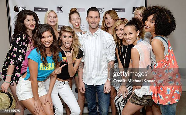 Adam Levine, surrounded by Wilhelmina models, celebrates the launch of his new women's collection for Kmart and Shop Your Way at Ace Gallery on April...