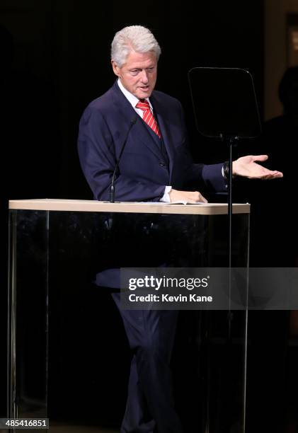 Former US President Bill Clinton speaks on stage at The 2014 Revlon Concert For The Rainforest Fund at Carnegie Hall on April 17, 2014 in New York...