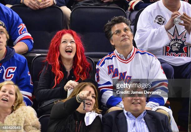 Cyndi Lauper and David Thornton attend the Philadelphia Flyers vs New York Rangers playoff game at Madison Square Garden on April 17, 2014 in New...