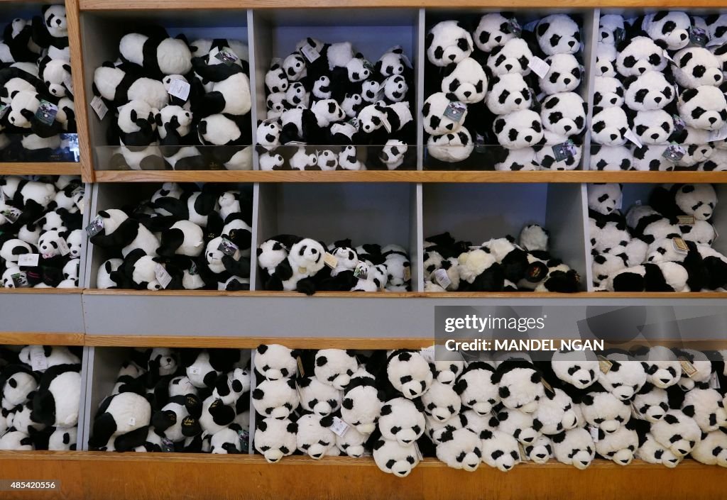 Panda. Shop Panda merchandise is seen inside a gift shop at the National Zoo on ...