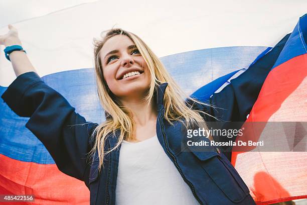 cheering woman under russian flag - beautiful russian girls stock pictures, royalty-free photos & images