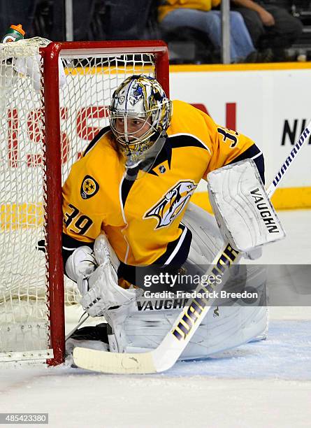 Goaltender Marek Mazanec of the Nashville Predators plays against the Tampa Bay Lightning during the preseason game at Bridgestone Arena on September...