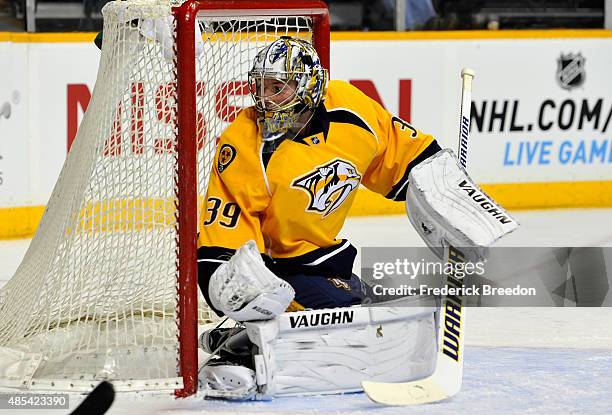 Goaltender Marek Mazanec of the Nashville Predators plays against the Tampa Bay Lightning during the preseason game at Bridgestone Arena on September...