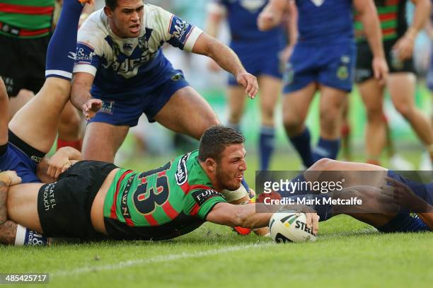 Sam Burgess of the Rabbitohs scores a try during the round seven NRL match between the South Sydney Rabbitohs and the Canterbury-Bankstown Bulldogs...