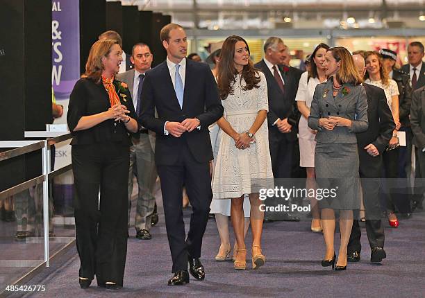 Prince William, Duke of Cambridge and Catherine, Duchess of Cambridge walk through the arts and craft pavilion during a visit to the Sydney Royal...