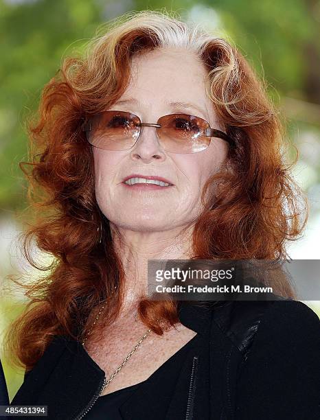 Recording artist Bonnie Raitt speaks during music executive Joe Smith's ceremony honoring him with a Star on the Hollywood Walk of Fame on August 27,...