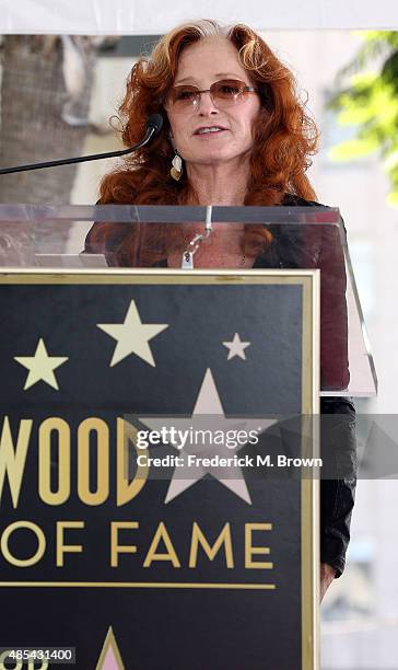 Recording artist Bonnie Raitt speaks during music executive Joe Smith's ceremony honoring him with a Star on the Hollywood Walk of Fame on August 27,...