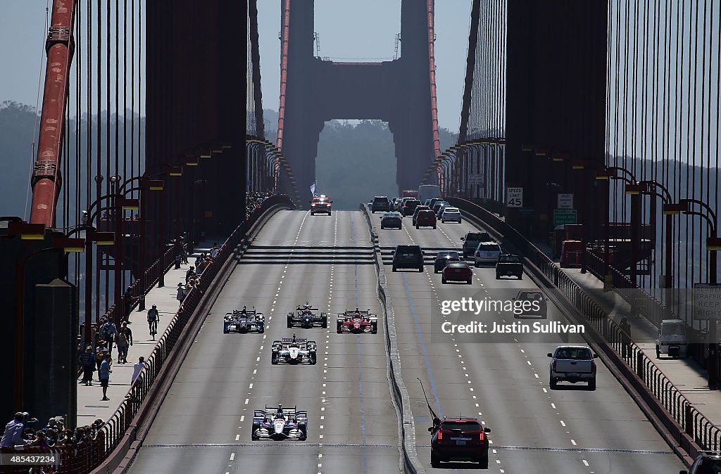 Marco Andretti Leads An Indy Car Motorcade Across The Golden Gate Bridge Honoring Driver Justin Wilson