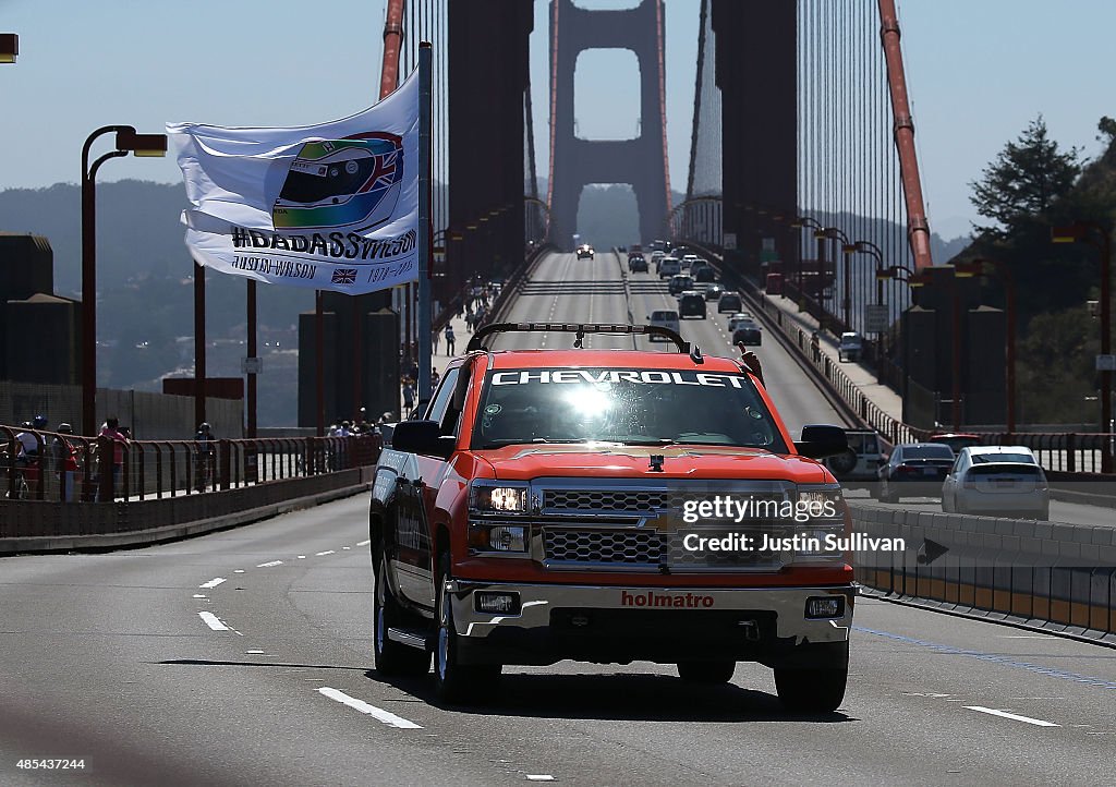 Marco Andretti Leads An Indy Car Motorcade Across The Golden Gate Bridge Honoring Driver Justin Wilson