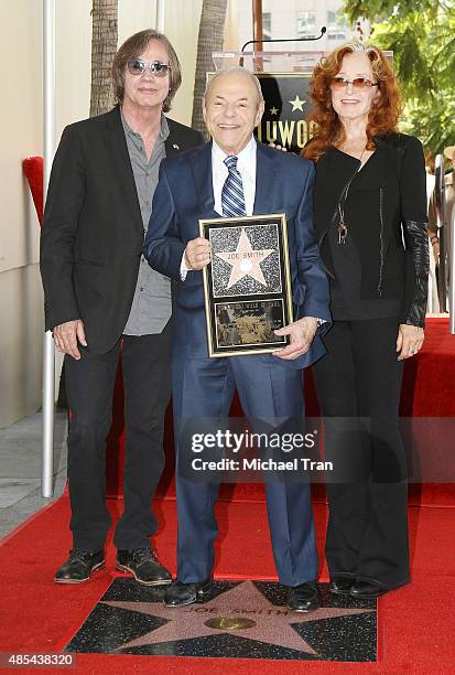 Jackson Browne, Joe Smith and Bonnie Raitt attend the ceremony honoring Joe Smith with a Star on The Hollywood Walk of Fame on August 27, 2015 in...