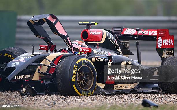 Pastor Maldonado of Venezuela and Lotus crashes off the track during practice ahead of the Chinese Formula One Grand Prix at the Shanghai...