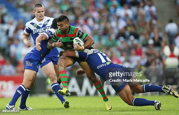 Nathan Merritt of the Rabbitohs is tackled during the round seven NRL match between the South Sydney Rabbitohs and the Canterbury-Bankstown Bulldogs...