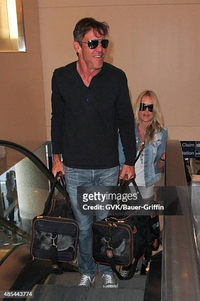 Dennis Quaid and Kimberly Quaid are seen at LAX. On August 27, 2015 in Los Angeles, California.