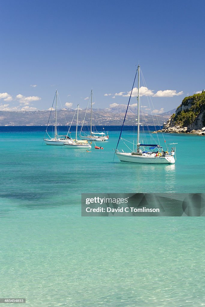 View across turquoise water, Lakka, Paxos, Greece