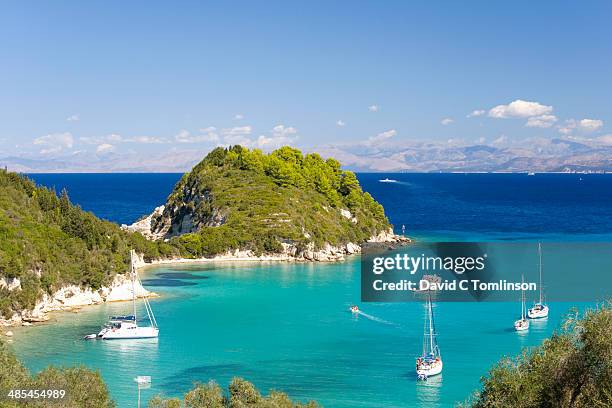 view over picturesque bay, lakka, paxos, greece - paxos stock pictures, royalty-free photos & images