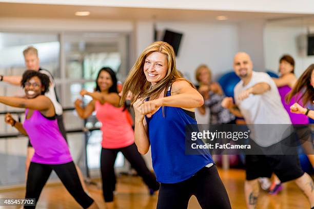 kickboxing class - practicing stock pictures, royalty-free photos & images