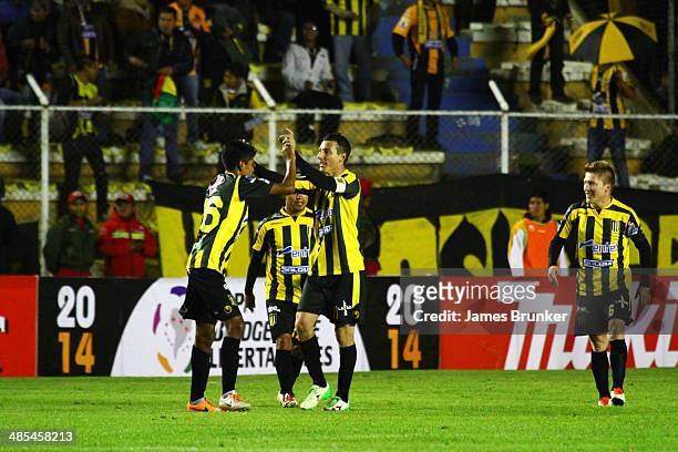 Players of The Strongest celebrate a scored goal during a match between The Strongest and Defensor Sporting as part of the Copa Bridgestone...