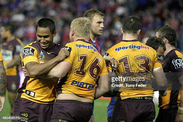 Ben Barba Ben Hannant and Matt Gillett of the Broncos celebrate a try during the round seven NRL match between the Newcastle Knights and the Brisbane...