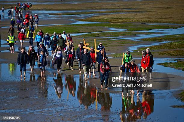 Nadia Coppola, 16 and Johanna Hanson, 5 lead pilgrims walking with crosses as the Northern Cross pilgrimage undertakes its final leg of the journey...