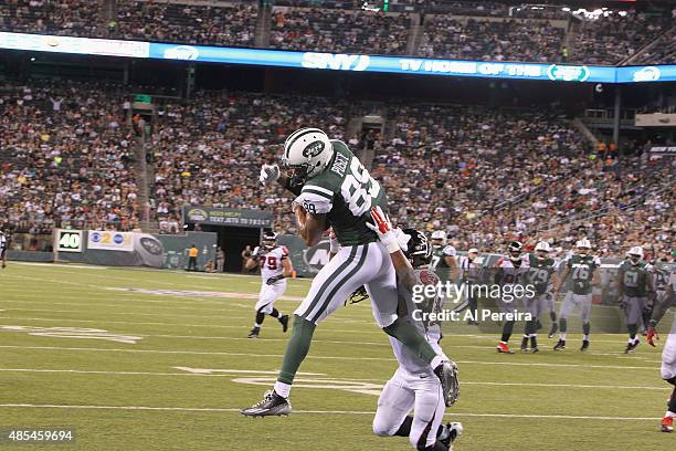 Wide Receiver DeVier Posey of the New York Jets has a Touchdown against the Atlanta Falcons at MetLife Stadium on August 21, 2015 in East Rutherford,...