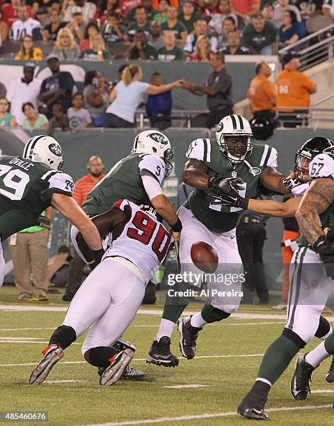 Linebacker Stansly Maponga of the Atlanta Falcons casues a fumble against the New York Jets at MetLife Stadium on August 21, 2015 in East Rutherford,...