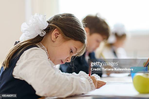 children writing in class - st petersburg school stock pictures, royalty-free photos & images