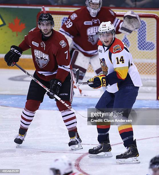 Brendan Gaunce of the Erie Otters skates against Ben Harpur of the Guelph Storm in Game One of the OHL Western Conference Final at the Sleeman Centre...