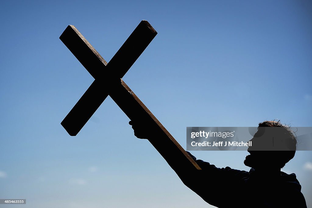 Pilgrims From Across The UK Carry Crosses To Holy Island
