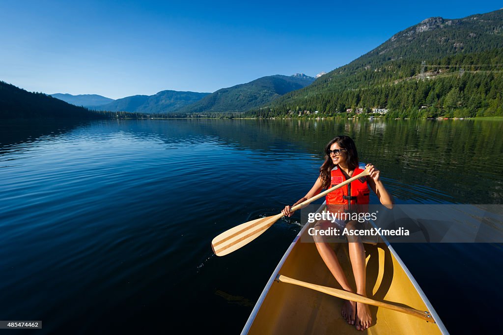 Canoeing on a prisitine mountain lake