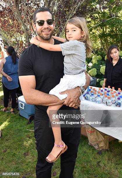 David Blaine and Dessa Blaine attend the Petit Maison Chic Charity Fashion Show Benefiting Beyond Type 1 on August 27, 2015 in Bridgehampton, New...