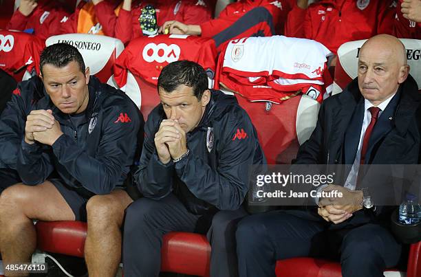 Assistant coach of Standard de Liege Eric Deflandre, assistant coach Sergei Gurenko and coach of Slavo Muslin look on before the UEFA Europa League...